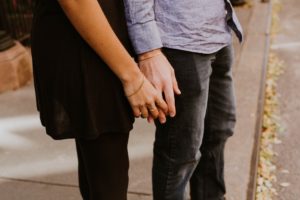 couple holding hands - dateless - dating coach
